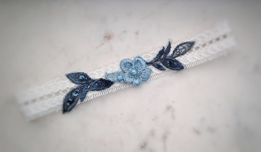 Lace wedding garter with light blue and navy lace motif