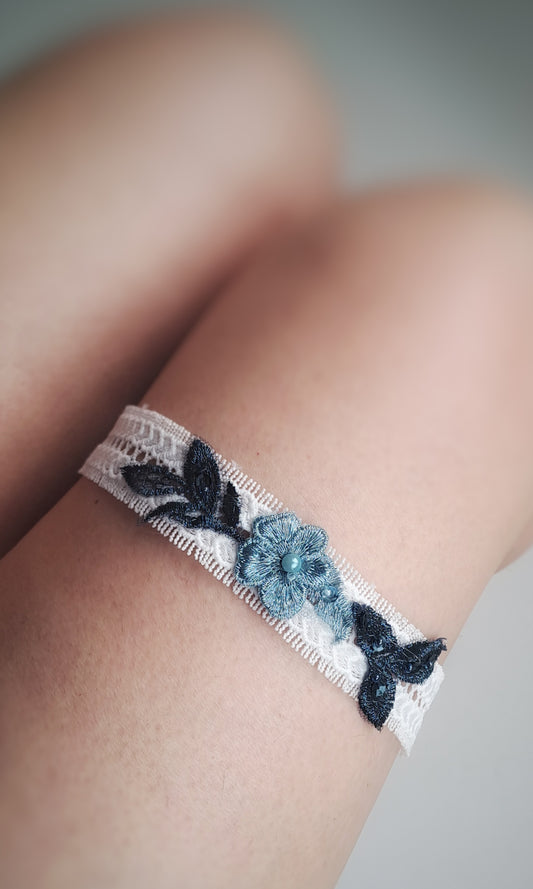 Lace wedding garter with light blue and navy lace motof