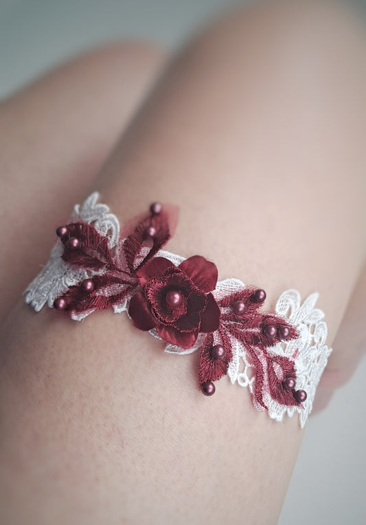 Lace wedding garter with burgundy lace motif